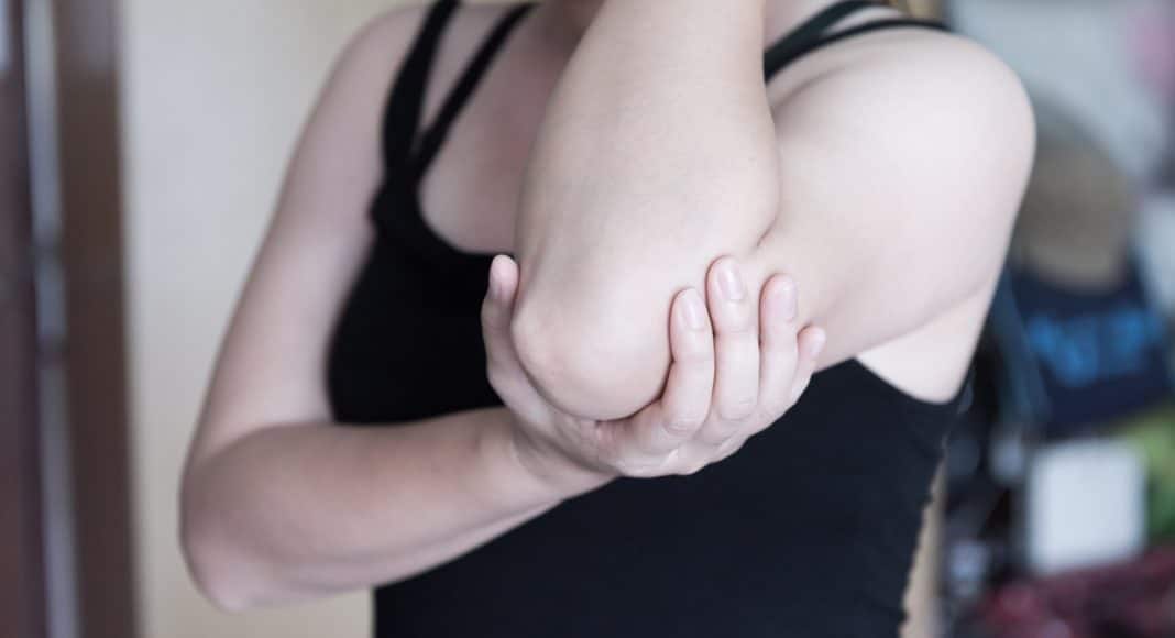 Woman elbow muscle